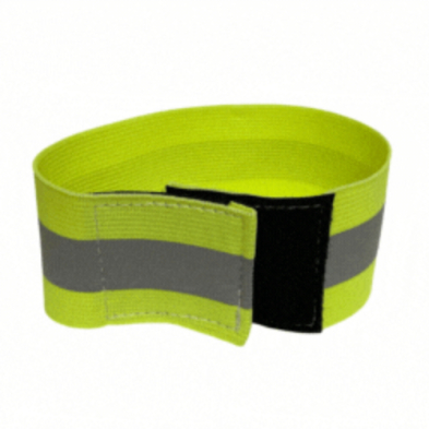 A yellow reflective arm or leg band with a grey stripe through the center and a velcro closure.