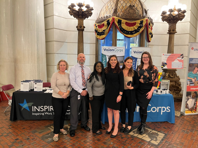 Group of people standing in the PA State Capitol Building.