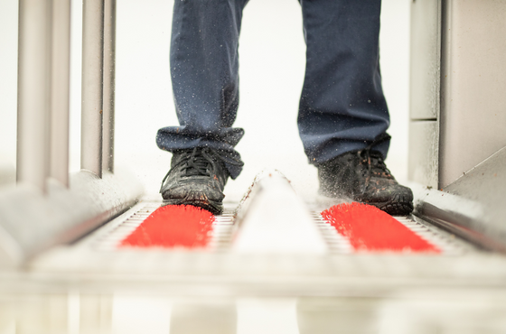 disinfect footwear in the hygiene sluice