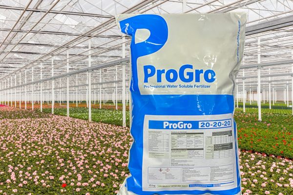 bag of progro water soluble fertilizer in a greenhouse