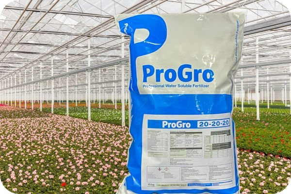 bag of progro water soluble fertilizer in a greenhouse